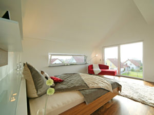 Schlafzimmer im Musterhaus Style von Fertighaus Weiss