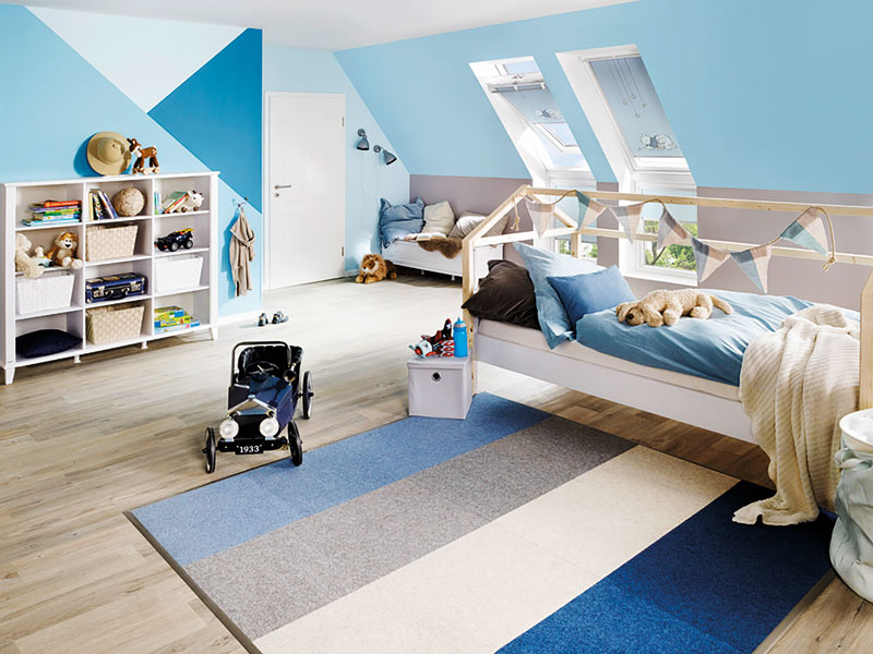 kindgerecht geplant: Kinderzimmer in unterschiedlichen Blautönen gestrichen