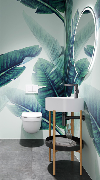 runder Waschtisch mit Spiegel und WC vor eindrucksvoller Wand aus Aluminium-Verbundplatten mit großen Blättern