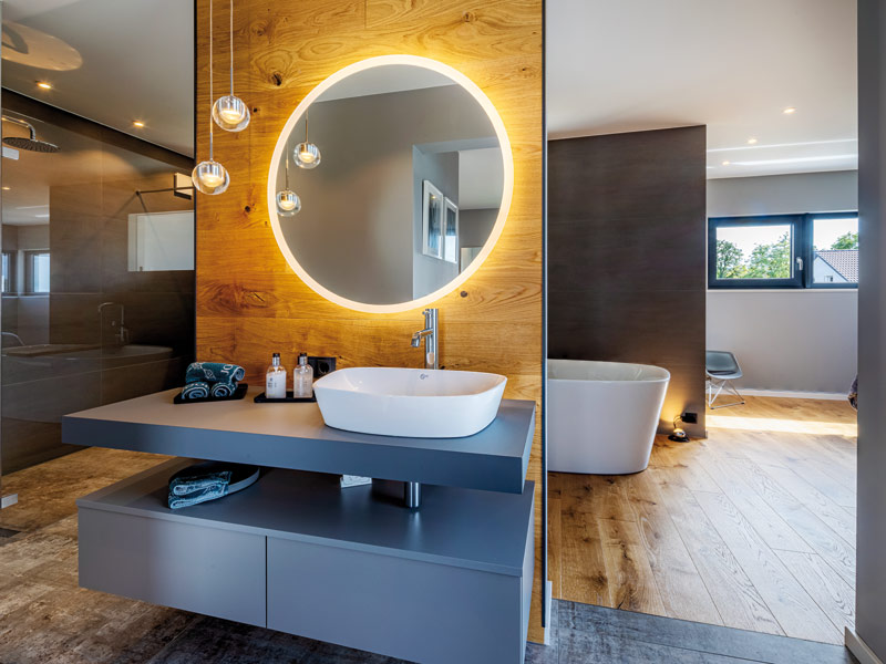 Wellness zu Hause moderner Waschtisch mit rundem Spiegel und einem Waschbecken